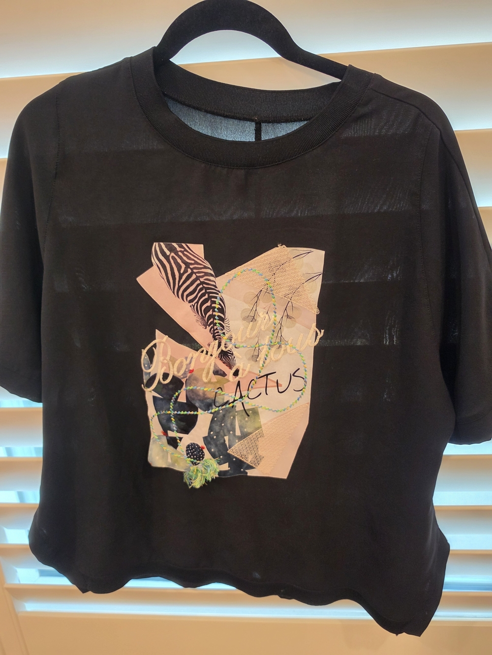 Black Short-Sleeve Graphic Tee with Pink Accent